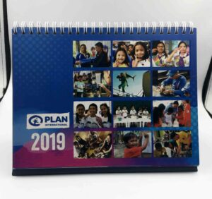 Plan International Philippines Desk Calendar #vjgraphicsprinting #growthroughprint #offsetprinting #deskcalendar #calendar — with Plan International Philippines in Quezon City, Philippines